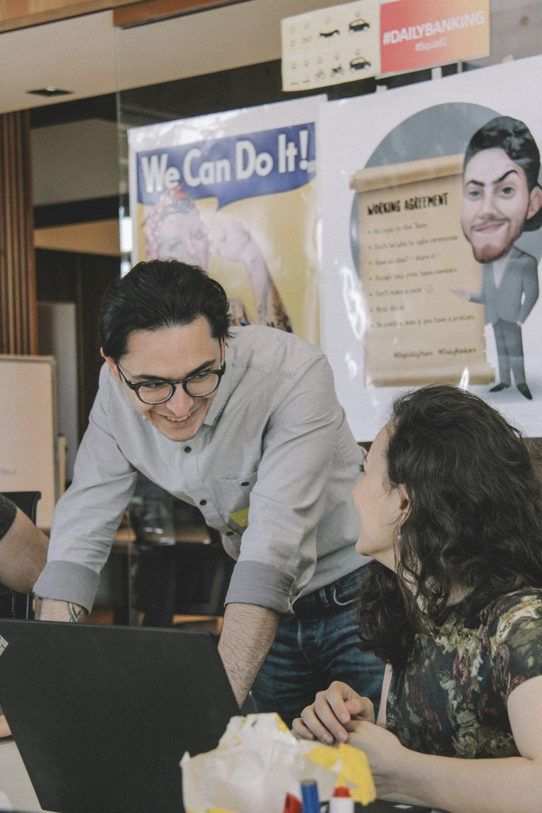 Founders discussing team building program around a desk