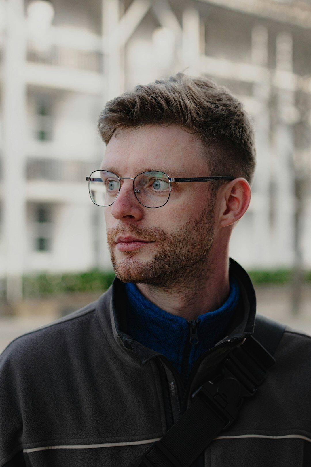 Studio portrait of a European man in his 40s, operations director