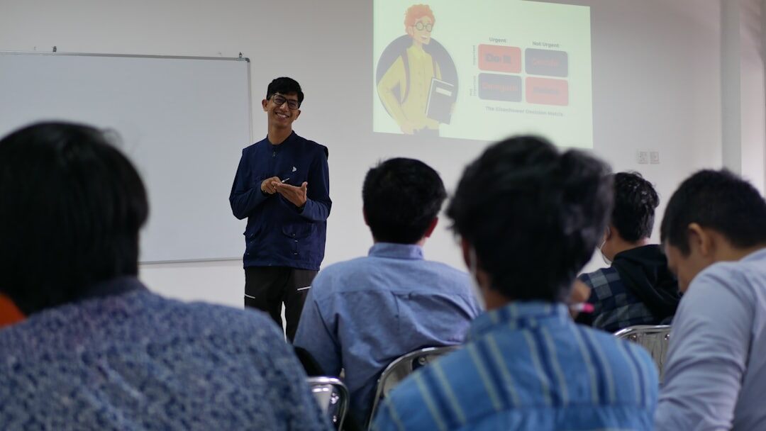 Facilitator leading an interactive workshop with a group of employees